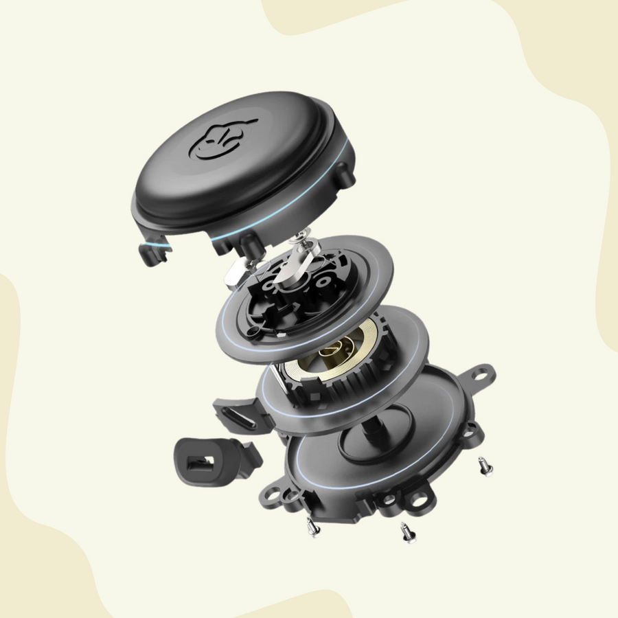 Retractable leash mechanism, showing its internal components. The image details each layer of the device, including the outer casing, internal gears, and attachment points, against a light background.